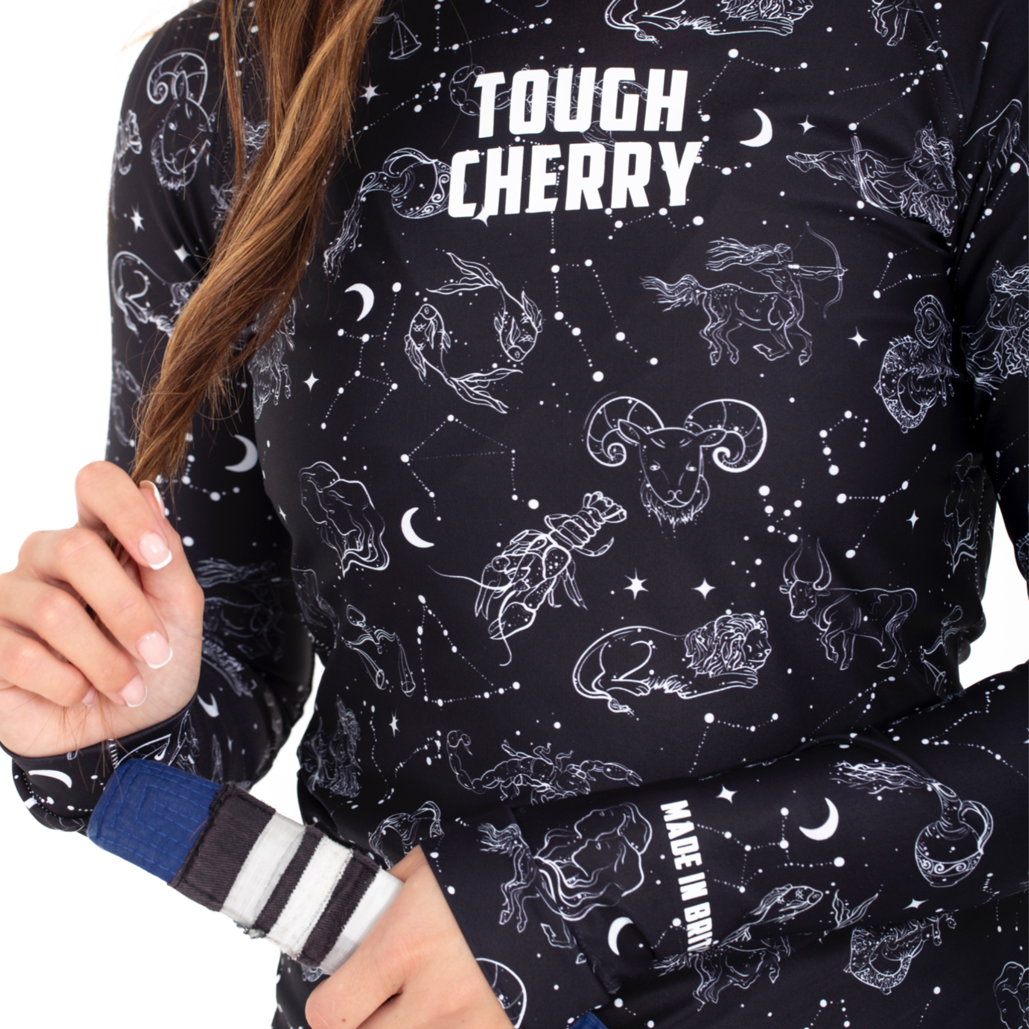Women's and Girls Long and short sleeved rash guard, constellation and star sign black and white print, close view