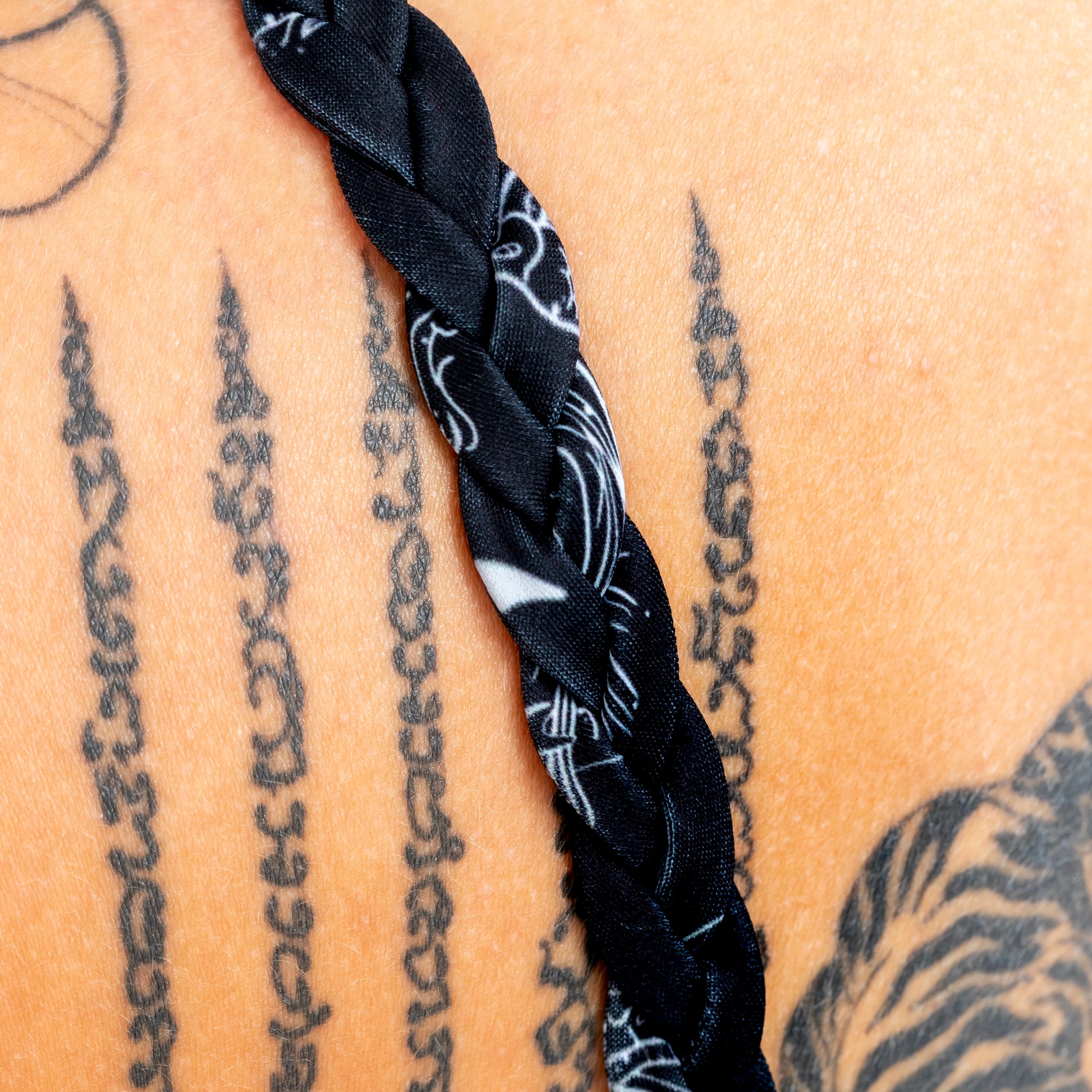 Tough Cherry Braided sports bra, in under the stars print in black with white constellations print, braided strap