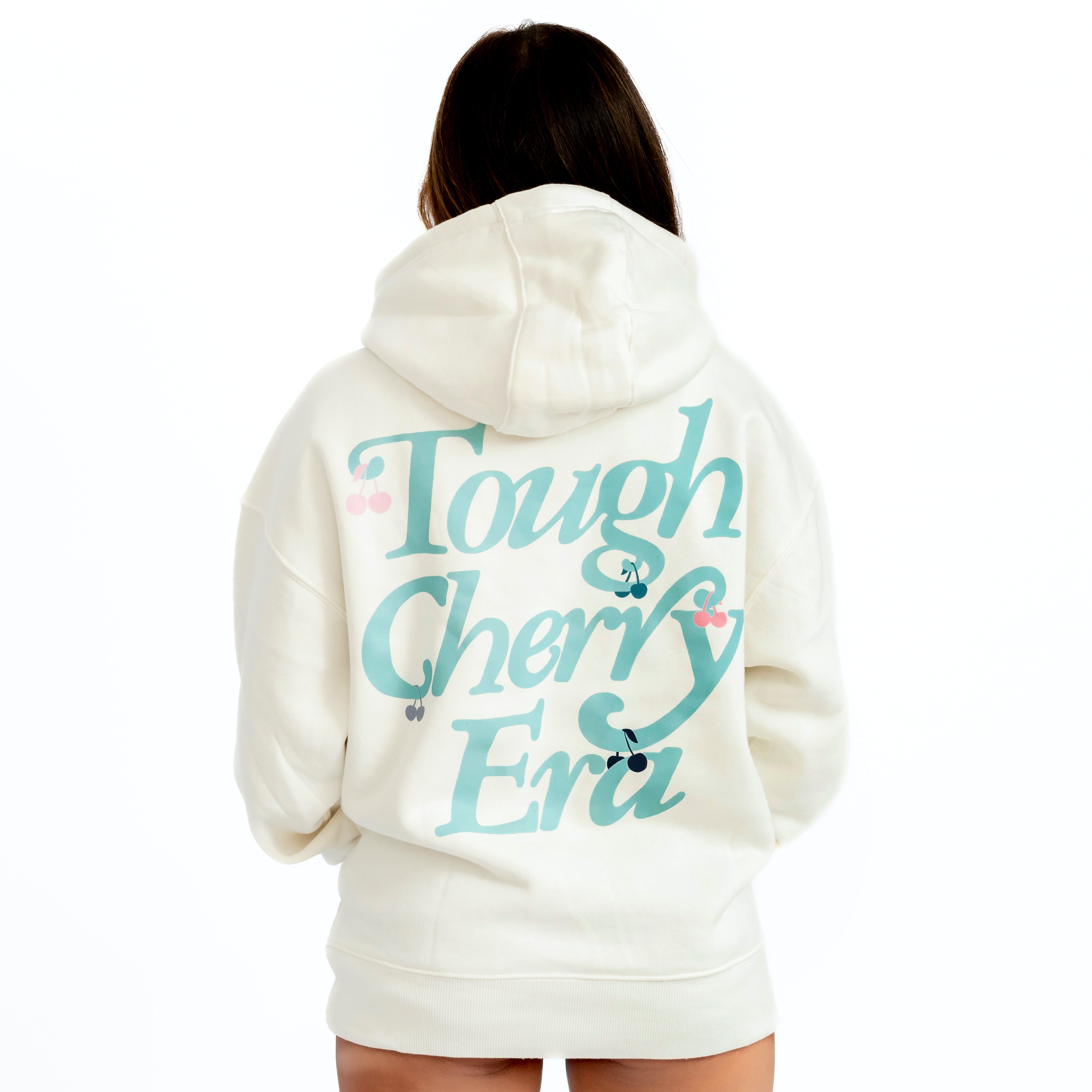 White tough cherry hoodie with baby blue tough cherry era text full back view 