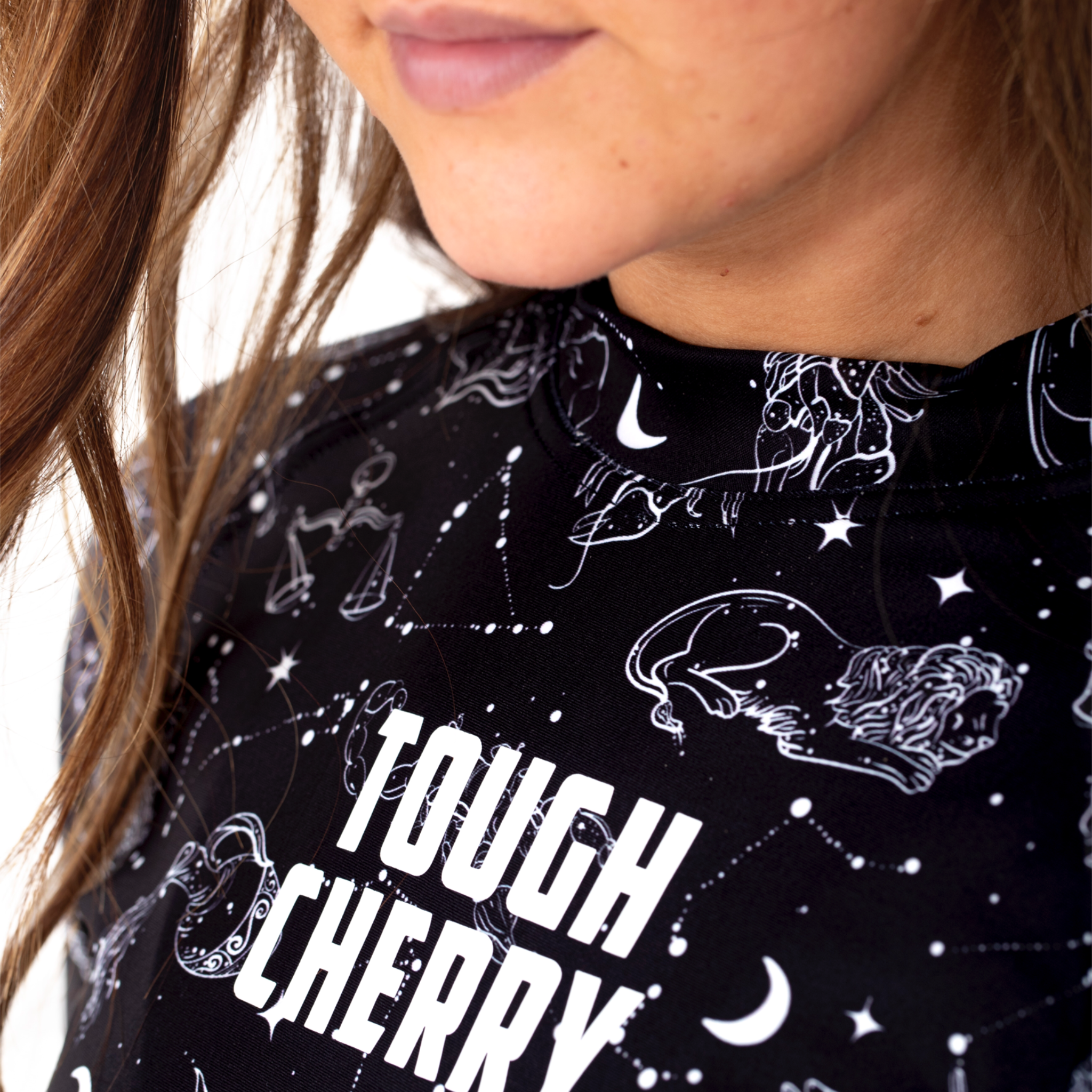 Women's and Girls Long and short sleeved rash guard, constellation and star sign black and white print, logo view 