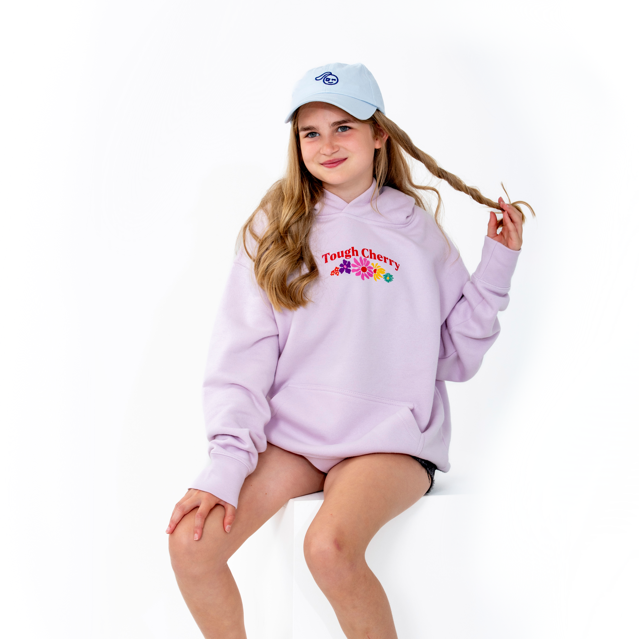 Women's and kids pink oversized hoodie with flower pattern, front view