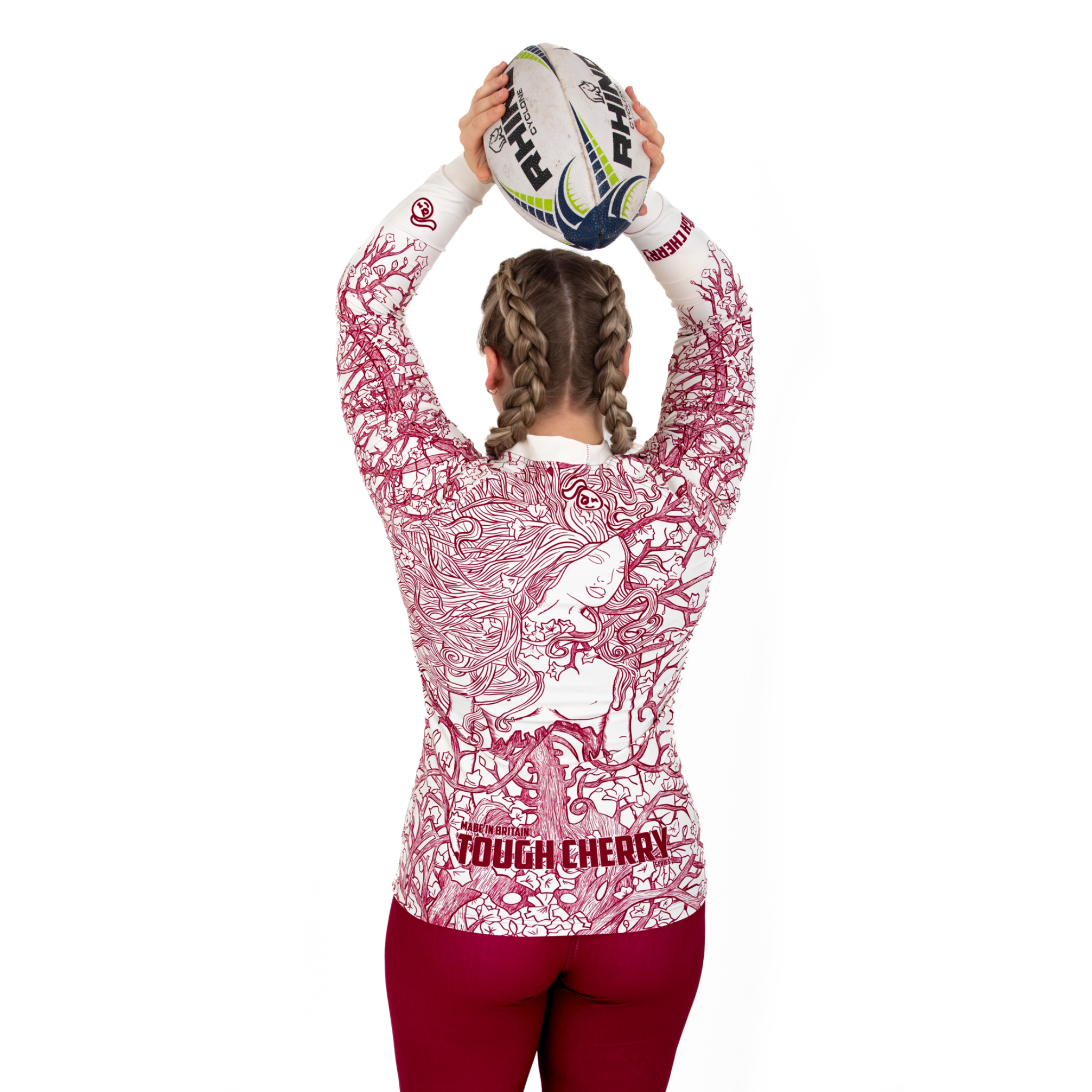 Women's, girl's long sleeved rash guard, skull and cherry blossom design, back view with rugby ball