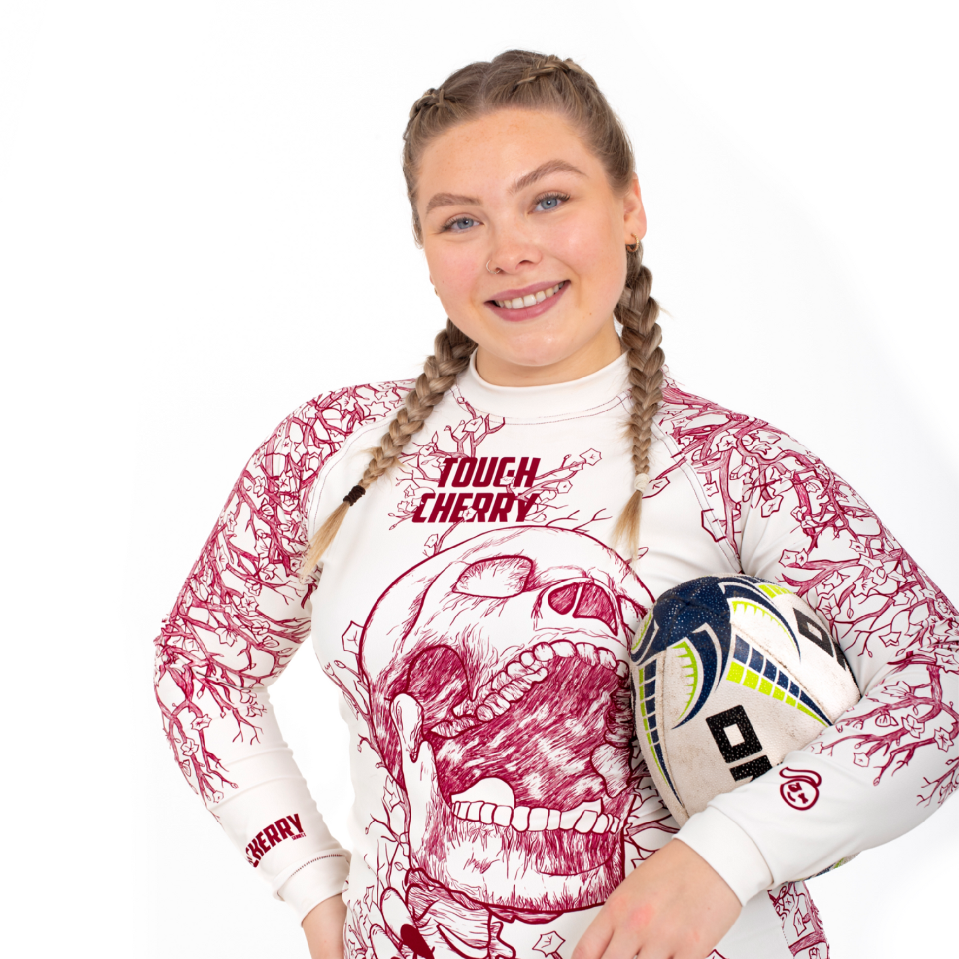Women's, girl's long sleeved rash guard, skull and cherry blossom design, front view