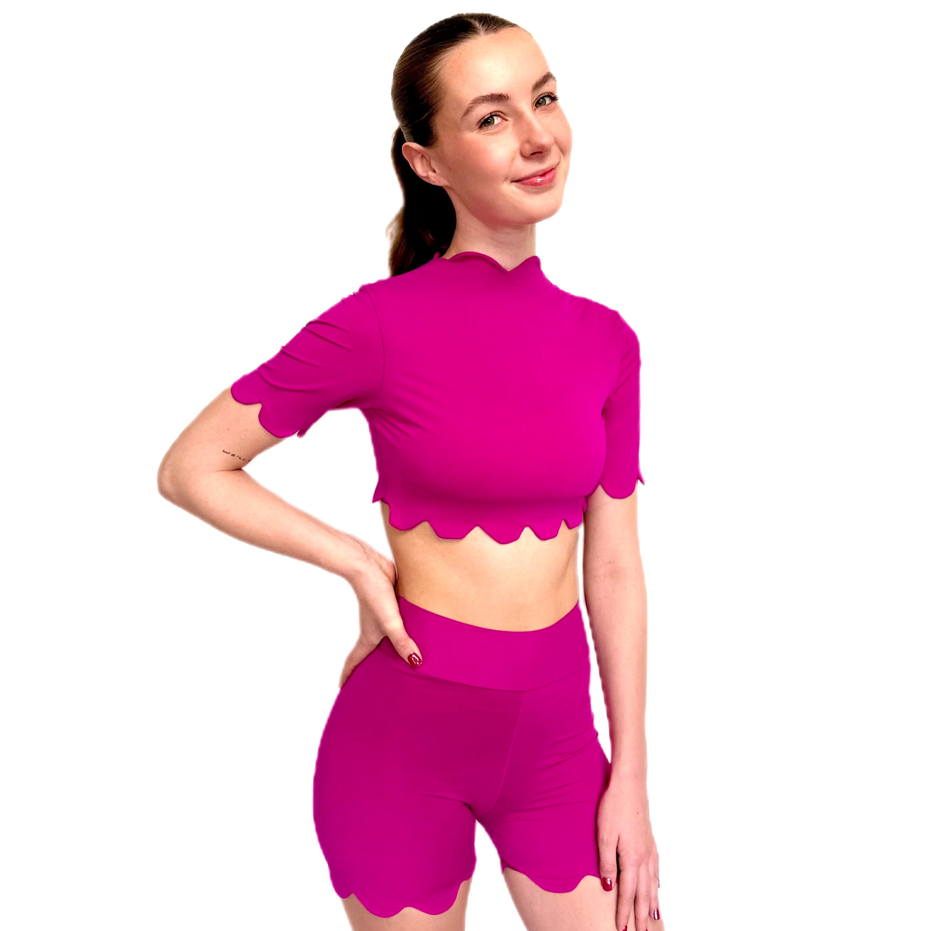 Tough Cherry Scalloped pink cropped short sleeve rash guard with matching pink scallop shorts